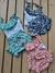 "Conjunto Super Fofo: Regata babado e Calcinha Tapa Fralda azul claro e flores– Conforto e Estilo para o Bebê!" na internet