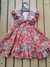 "Vestido Florido com Fundo avermelhado 3D, Maxi Laço nas Costas e Ombro Babado: Elegância e Estilo Floral em Cada Detalhe!" - comprar online
