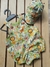 "Jardineira Max Conforto + boné: Estilo e Bem-Estar para o Seu Bebê!" " (ZOO fundo verde claro )