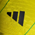 Camisa Jamaica I 23/24 - Jogador Adidas Masculina - Amarela com detalhes verde e preto - Rush SportShop
