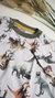 Remera Dino con bolsillo en internet