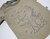 Remera crema con dino - comprar online