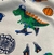 Pijama Infantil Inverno Moletinho Felpado Blusa Gola V Branca com Estampa de Dinossauros e Calça Marinho CANDY KIDS na internet