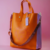 CARTERA ROCAS LOUISE NARANJA