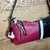 Bolsa Sirius preta e pink na internet