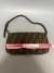FENDI BAGUETTE ZUCCA na internet