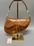 DIOR SADDLE LEATHER TRESSE na internet