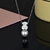 Collar con Dije "Tierno Osito" sobre un Perla