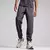 Calça Track Puma PUMATECH Masculina Galáctico Cinza-Avermelhado P na internet