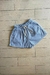 Short de gabardina