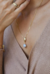 CONJUNTO DE PÉROLAS COM BASE TEXTURIZADA (OURO) - comprar online