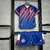 Camisa e shorts do Kit Infantil Bahia 24/25, com design em azul, vermelho e detalhes em branco.