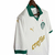 Camisa do Palmeiras 24/25 manto 2, modelo masculino, branca com detalhes em verde e dourado.