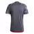 Camisa do Flamengo 2024/25, vista traseira, manto 3, com design cinza e detalhes em vermelho.