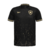 Camisa preta do Botafogo 24/25 com detalhes em dourado, incluindo o escudo do time e gola estilizada.
