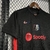 Camisa do Barcelona 24/25 manto 2, na cor preta com detalhes em vermelho, logotipo da Nike e patrocinador Spotify.