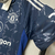 Camisa do Manchester United 24/25, manto 2, com logo e design em azul escuro.