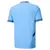 Camisa masculina Manchester City 24/25, vista traseira em azul claro com detalhes na gola e punhos.
