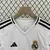 Camiseta do Kit Infantil do Real Madrid 24/25, com detalhes em preto e logo do time.