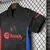 Camiseta infantil do Barcelona, modelo 24/25, na cor preta, com detalhes em azul e vermelho.
