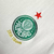 Emblema do Palmeiras com estrela vermelha e texto "100 anos" em destaque.