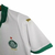 Camisa do kit infantil do Palmeiras 2024/2025, com gola verde e detalhes em branco.