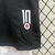 Detalhe da camisa infantil do Vasco 24/25, com o número 10 e o símbolo do clube em destaque.