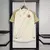 Camisa feminina do Vasco, modelo 24/25, manto 3, com detalhes em dourado e o escudo do time em destaque.