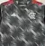 Camisa feminina do Flamengo 24/25, manto 3, com detalhes em preto e vermelho e logo do clube.