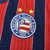 Camisa do Bahia puma torcedor Tricolor 25/26 com listras verticais vermelhas e azuis e logo do clube no peito.