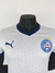Camisa branca da puma jogador do Esporte Clube Bahia com detalhes em azul e escudo do time, temporada 25/26, Camisa nova do Bahia.