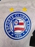 Camisa branca da puma jogador do Esporte Clube Bahia com detalhes em azul e escudo do time, temporada 25/26, Camisa nova do Bahia.