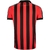 Camisa do Vitória volt Manto 1 temporada 2025/2026 com listras verticais vermelhas e pretas é uma linha branca.