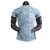 Camisa versão jogador da seleção de Portugal, vista traseira, com design moderno e detalhes em azul.