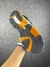 New Balance 860 - Preto/Laranja na internet