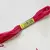 Imagen de hilo mouline tonos rosa y rojo