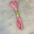 Imagen de hilo mouline tonos rosa y rojo