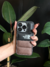 Funda The North Face Puffer Marrón para iPhone - Estilo Outdoor Elegante - blackphone