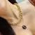 Pingente Lacre Preto Banhado a Ouro - comprar online