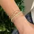 Bracelete Tubo Bambu Banhado a Ouro - comprar online