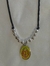 Collar con dije en internet