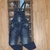 Macacão jeans bolso na frente