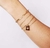 Pulseira Sandy coração vazado