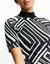 T-SHIRT GRAFICO DIAGONAL- SHOULDER