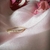 ANILLO ORO 18K MEDIO SIN FIN CON CUBICS