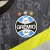 Camisa Grêmio Treino 23/24 - Torcedor Umbro Feminina - Cinza com detalhes em preto e amarelo - tienda online