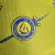 Camisa Al-Nassr I 23/24 - Jogador Nike Masculina - Amarela com detalhes em azul - loja online