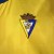 Kit Infantil Cadiz I Macron 23/24 - Amarelo com detalhes em azul - tienda online
