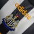 Camisa Newcastle United I Retrô 95/97 - Adidas Masculina - Branca com listras pretas e detalhes em amarelo - Cadfer Sports