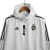 Jaqueta Corta-Vento Real Madrid 23/24 - Masculina Adidas - Branca com listras pretas - Cadfer Sports
